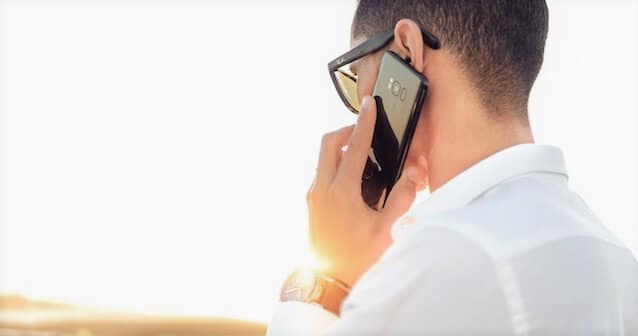 Man talking through a smartphone