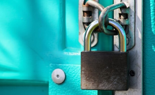 black lock on a blue door