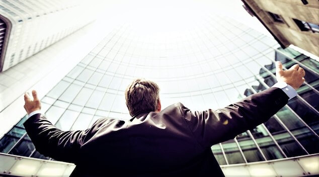 Man rising hands at the sky