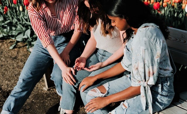 Women conforting each other